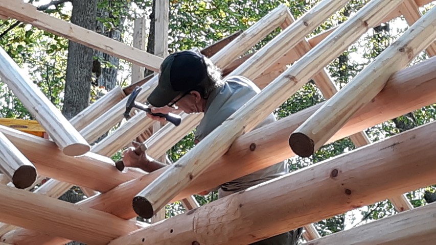 Carpentry Maintenance worker with mallet