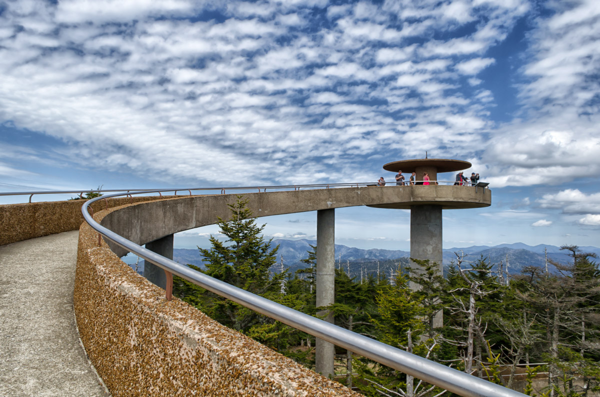 Clingmans Dome Observation Tower_Kristina Plaas View of the concrete tower, metal railing, and a small group of people at the top of the tower enjoying the view.