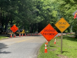 Improving Park Headquarters Road Orange road construction signs and cones inform visitors of road work