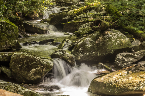 Waters cascades through rocks