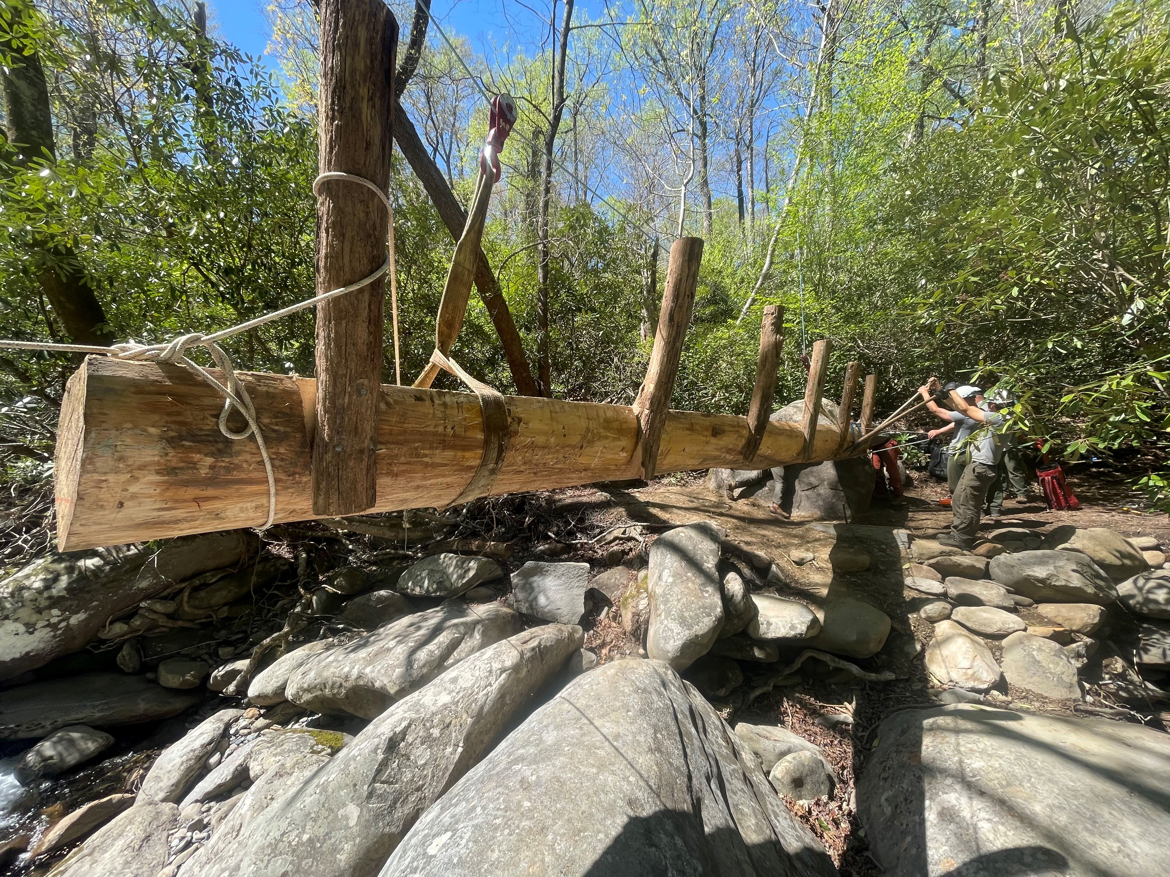 Trail crew installs Porters Creek footlog