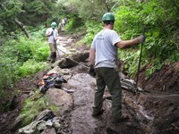 Using rigging equipment to move rock