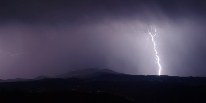 View from Look Rock Tower -- A lightning bolt hits the mountains on the western edge of the park.