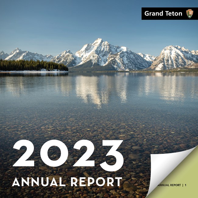 Grand Teton 2023 Annual Report Cover with photo of Jackson Lake and the snow-covered Teton Mountain Range