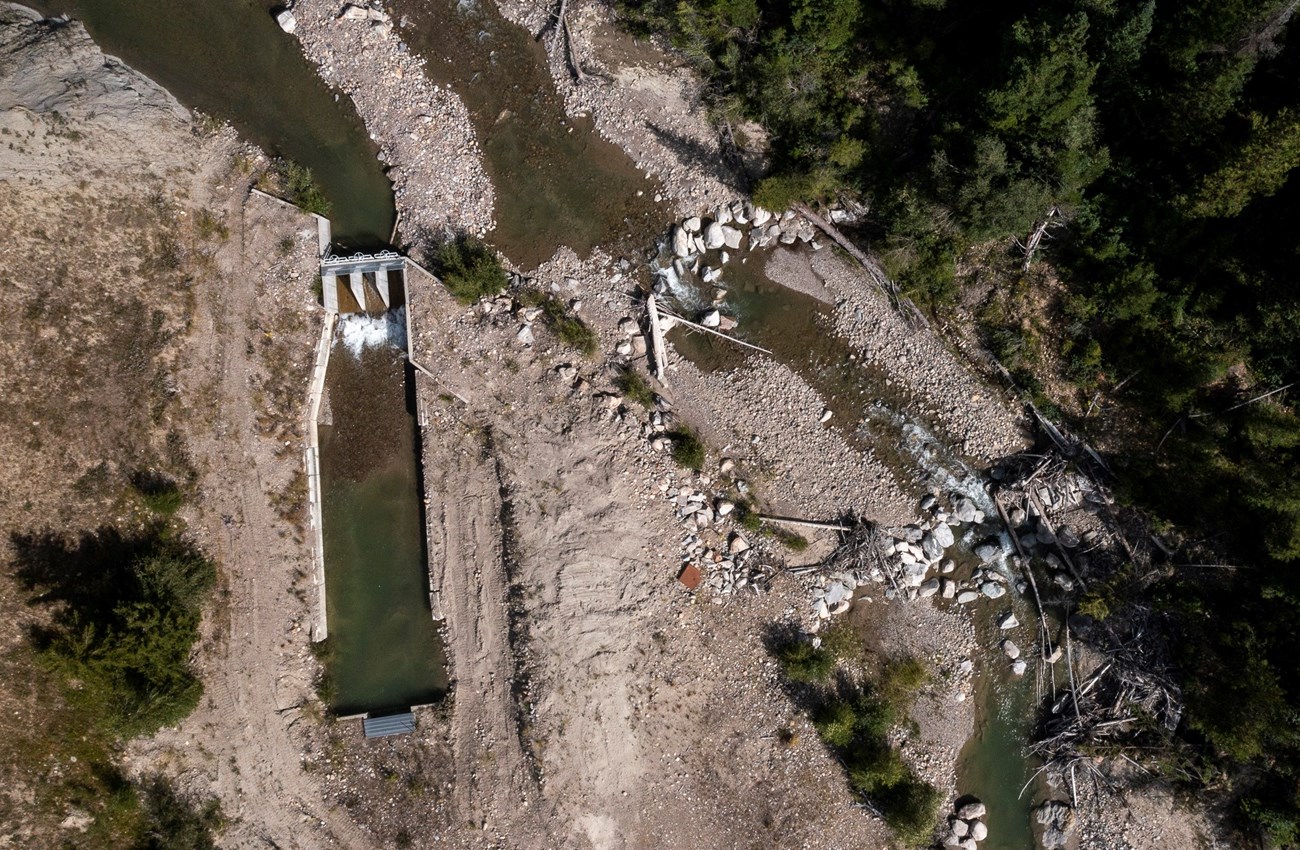 Aerial view of the Spread Creek irrigation system, including the headgate and ditch (left), and the current rock diversion structure (right). Through the project, a fish screen will be installed on the ditch, and the diversion will be repaired and made mo