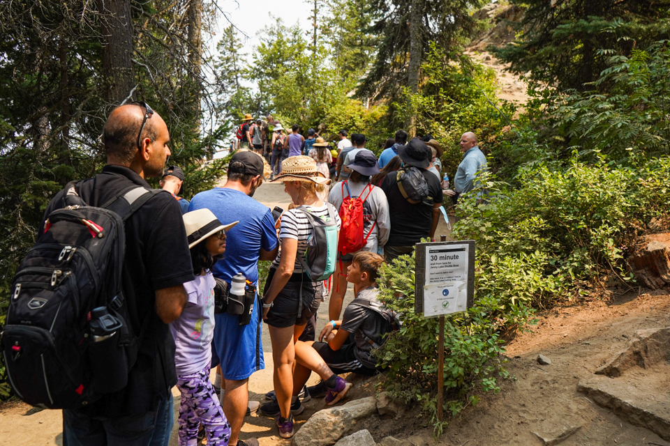 Changing Visitation Visitors wait in line in the backcountry of Grand Teton National Park