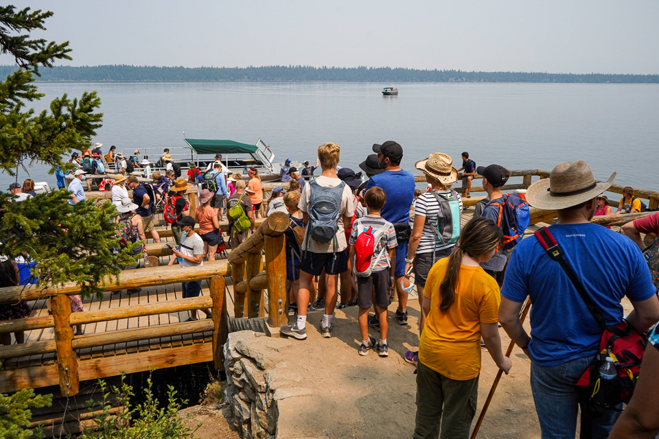 Crowd gathers at Jenny Lake west boat dock Crowd gathers at Jenny Lake west boat dock