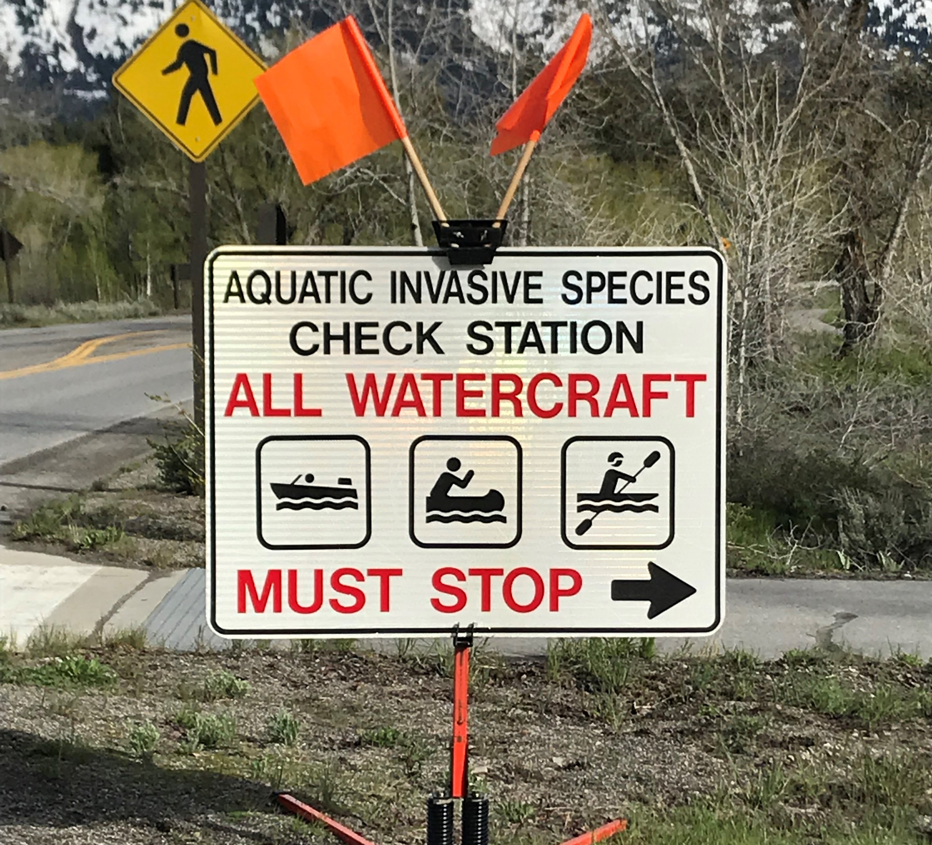 Photo of the park sign for the aquatic invasives check in station.