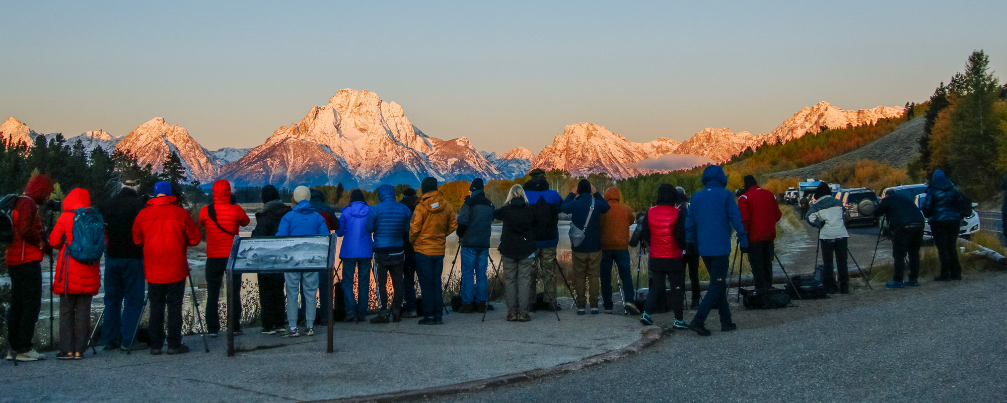 Visitors and photographers gather at Oxbow Bend in Grand Teton Visitors and photographers gather at Oxbow Bend to take sunrise photos of the Teton Range and Snake River