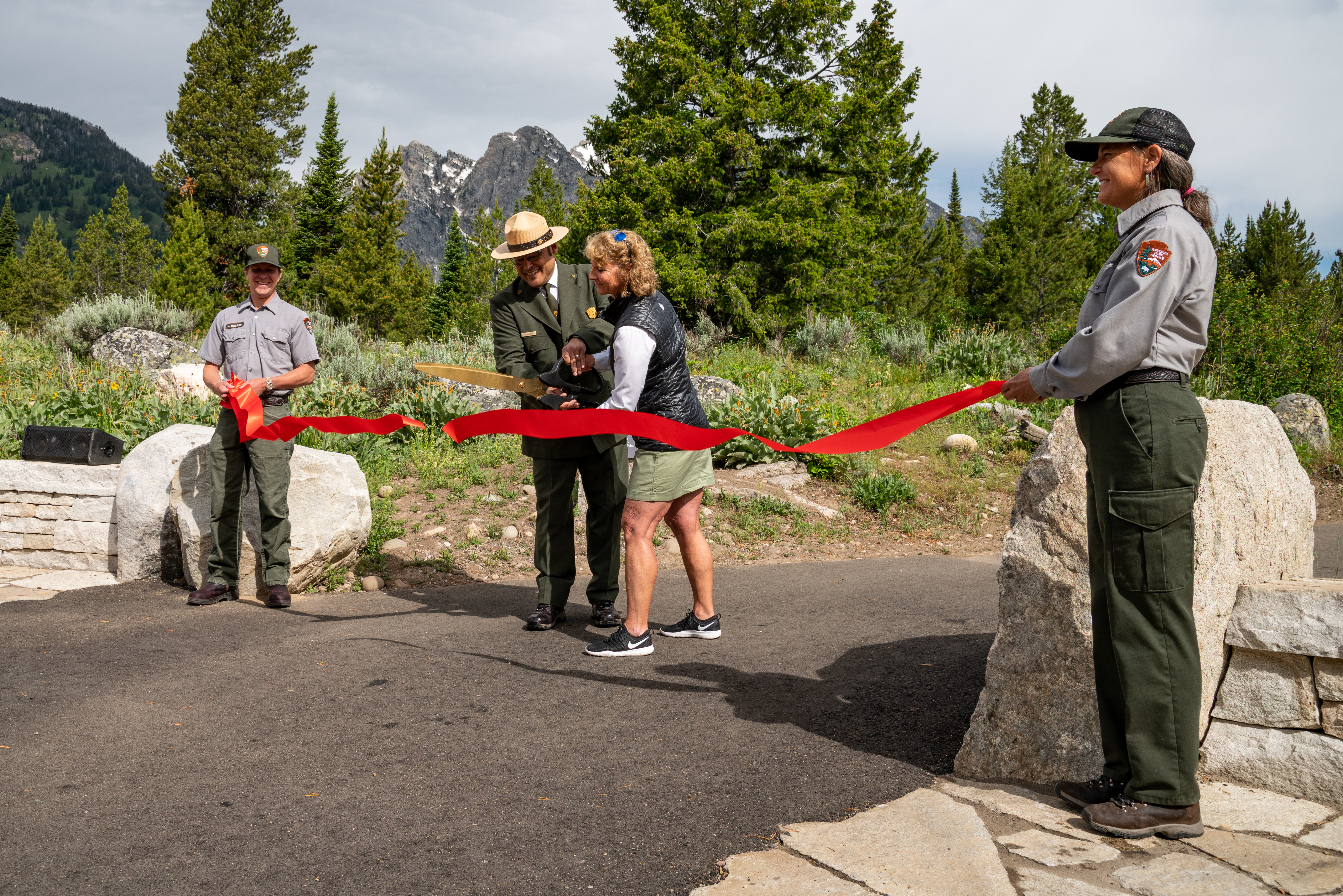 Acting Deputy Director of Operations for the National Park Service David Vela and Grand Teton National Park Foundation President Leslie Mattson cut the ribbon at the Jenny Lake Renewal Project