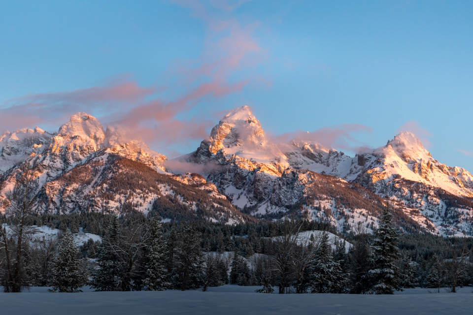 Wintery snow covered Teton range and snow-covered landscape