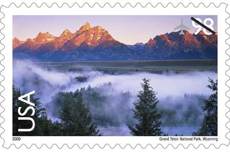 Grand Teton International Stamp photo of the Teton Range with fog.