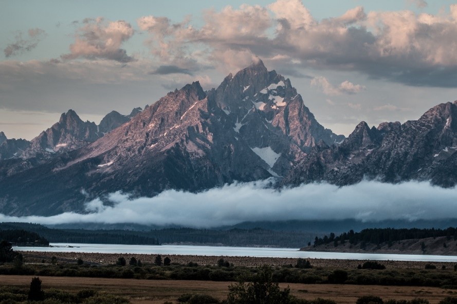 Grand Teton National Park NPS/Adams Clouds surround the major peaks of the Teton Range over Jackson Lake and Willow Flats