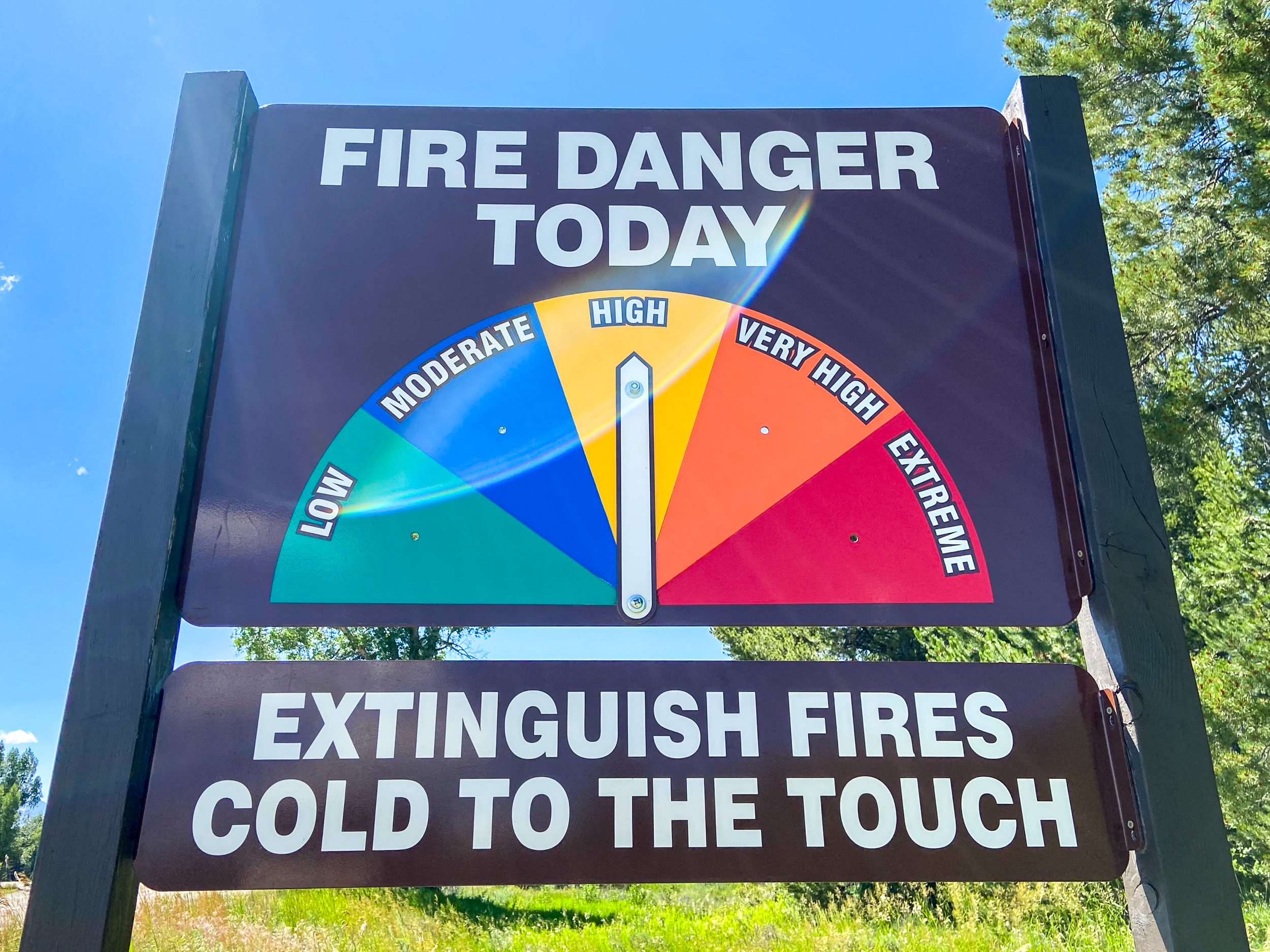 High Fire Danger Sign Sign that reads, "Fire Danger Today," with an arrow pointing to "High" and a message below that says, "Extinguish Fires Cold to the Touch"