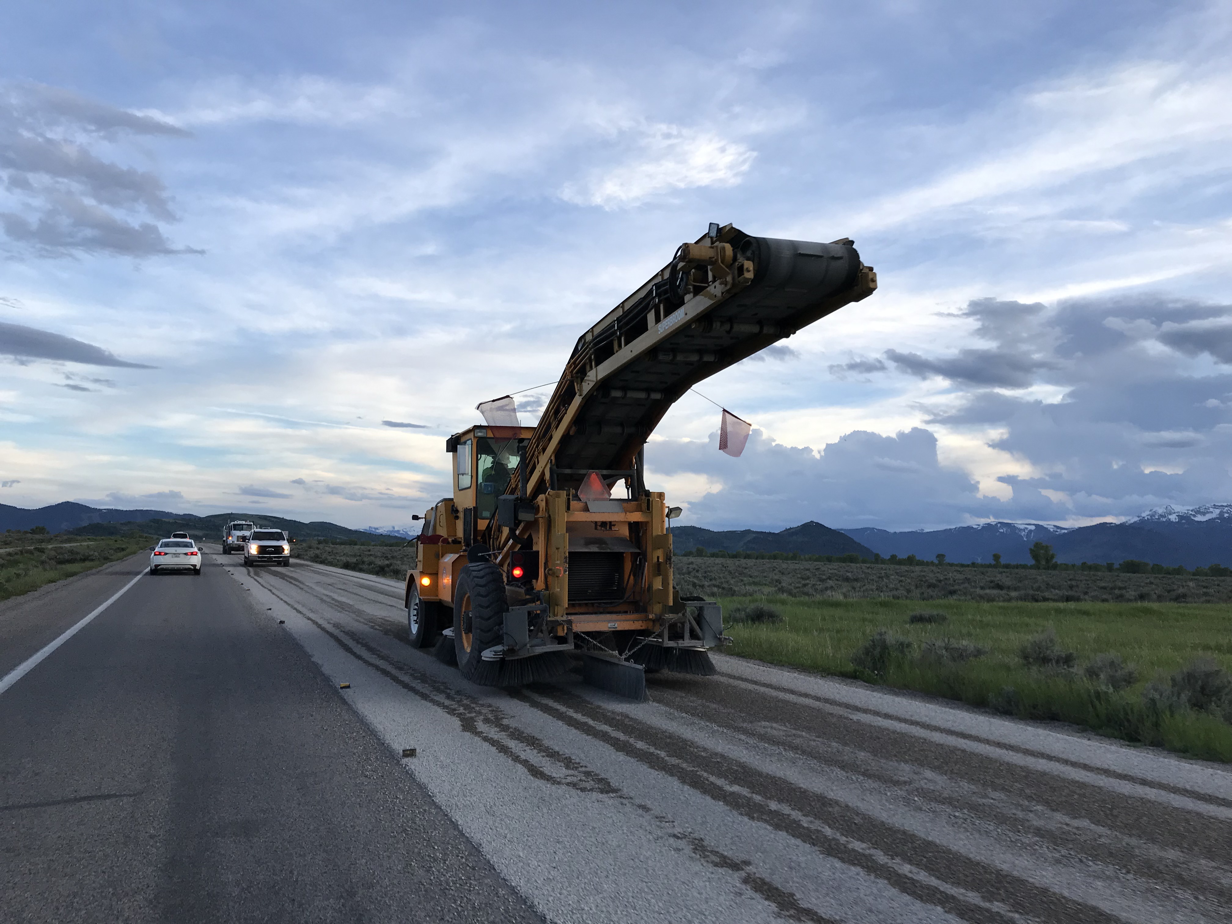 Large road construction vehicle on Highway 89