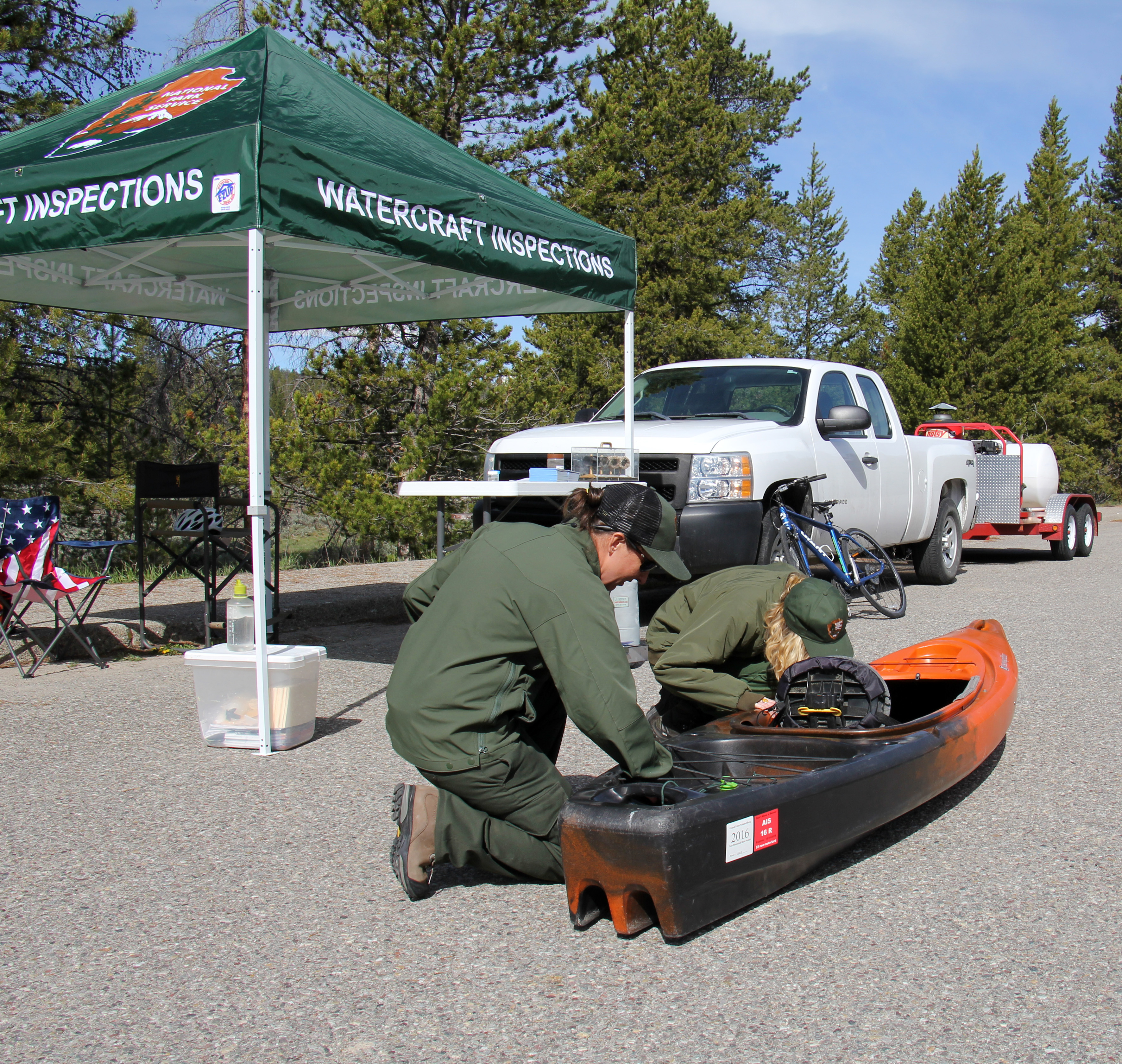 NPS Photo/Kayak Inspection Rangers Inspect Watercraft at Aquatic Invasive Species Inspection Station