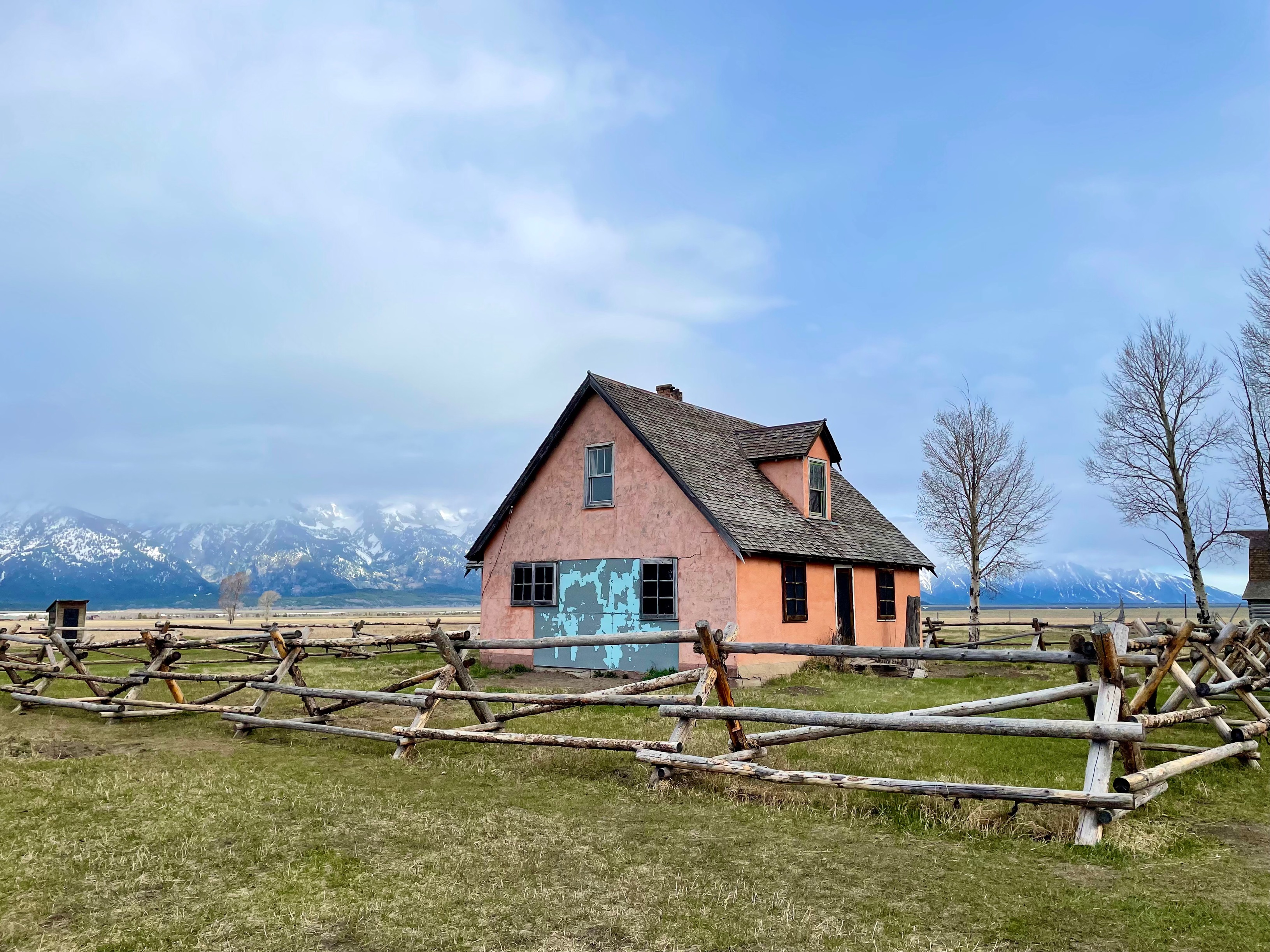 a house inside a fenced area