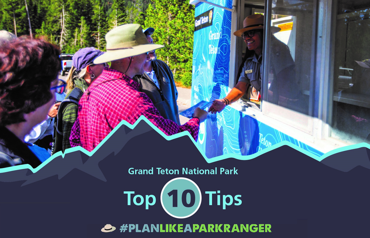 Ranger gives information to park visitors from mobile visitor center