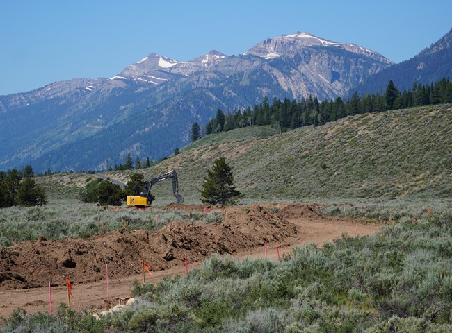 Construction equipment works in vacinity of Teton Park Road