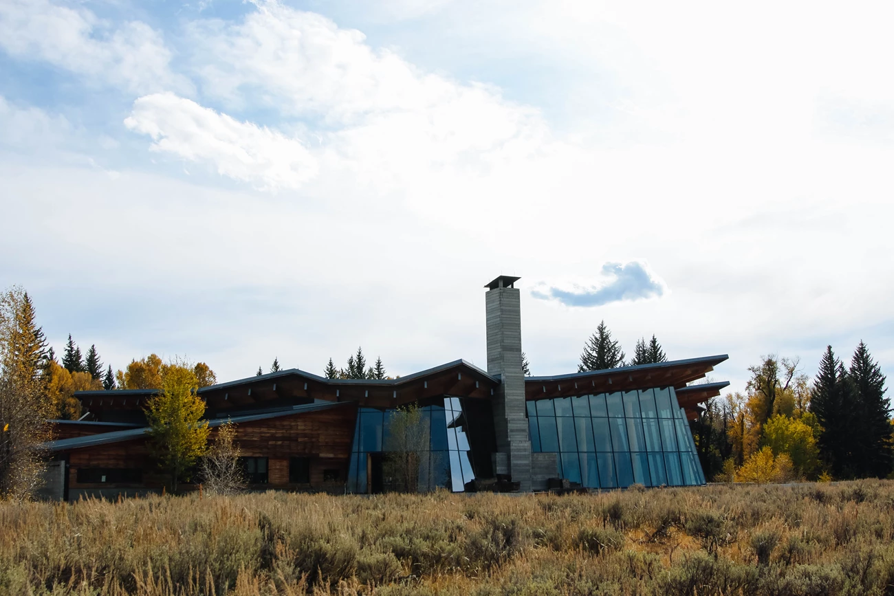 The Craig Thomas Discovery and Visitor Center A building with large windows.