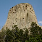 Large rock pillar jutting out of the landscape.