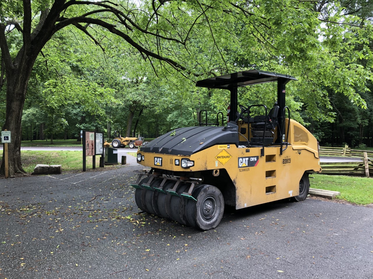 Repaving machine at GUCO A CAT paving machine sits in a parking lot