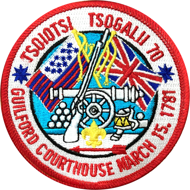 Patch shows American and British flags, a musket, and cannon