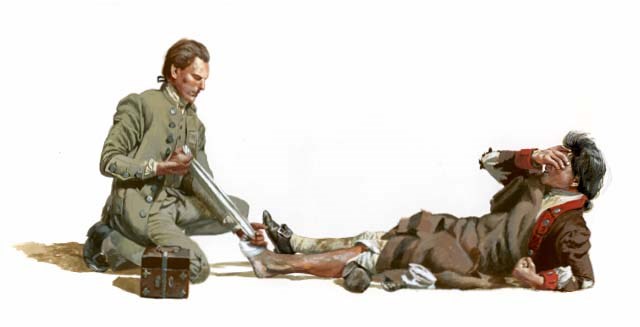 A surgeon (wearing green) bandages a soldier's foot. The soldier is laying on the ground writhing in pain, wearing a brown and red uniform.