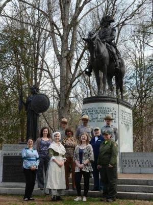 Ten Rangers, staff, and interns stand in front of the General Nathanael Greene Monument Ten Rangers, staff, and interns stand in front of the General Nathanael Greene Monument