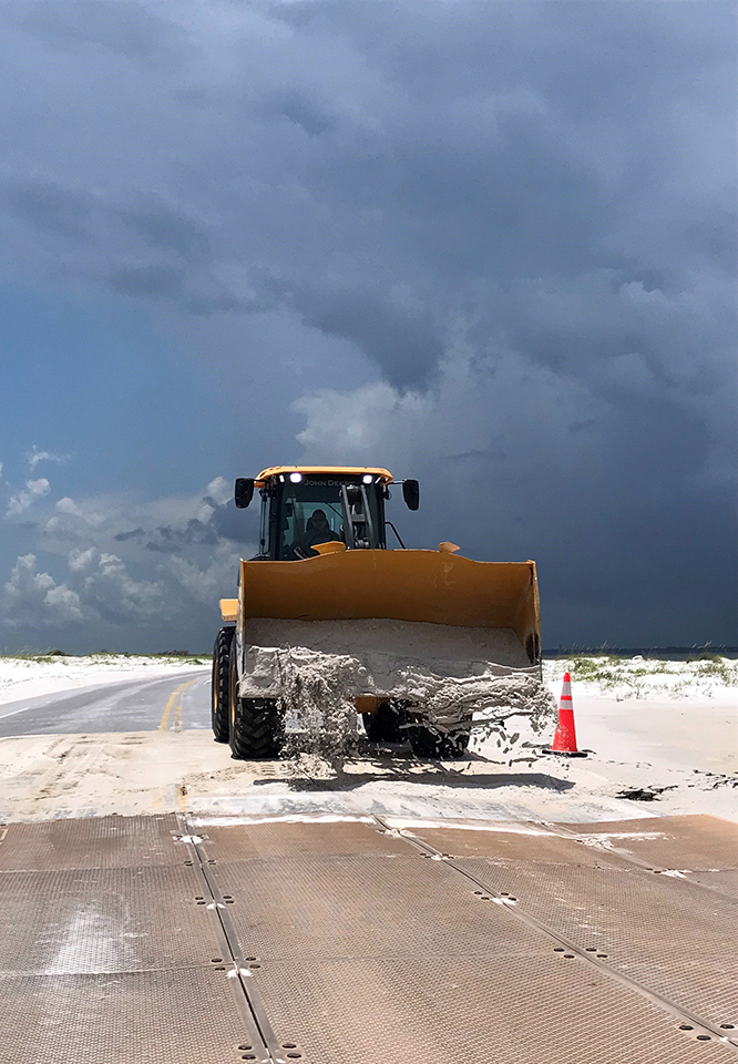 Fort Pickens Road 1 Repairs to road with forklift