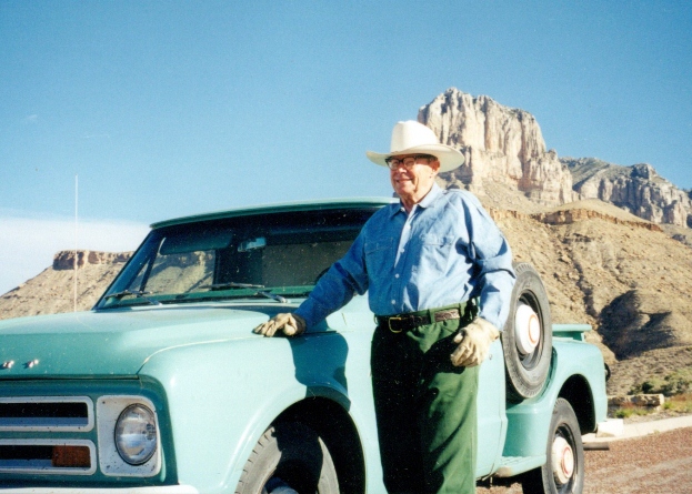 Former employee Roger Reisch and his signature green truck.