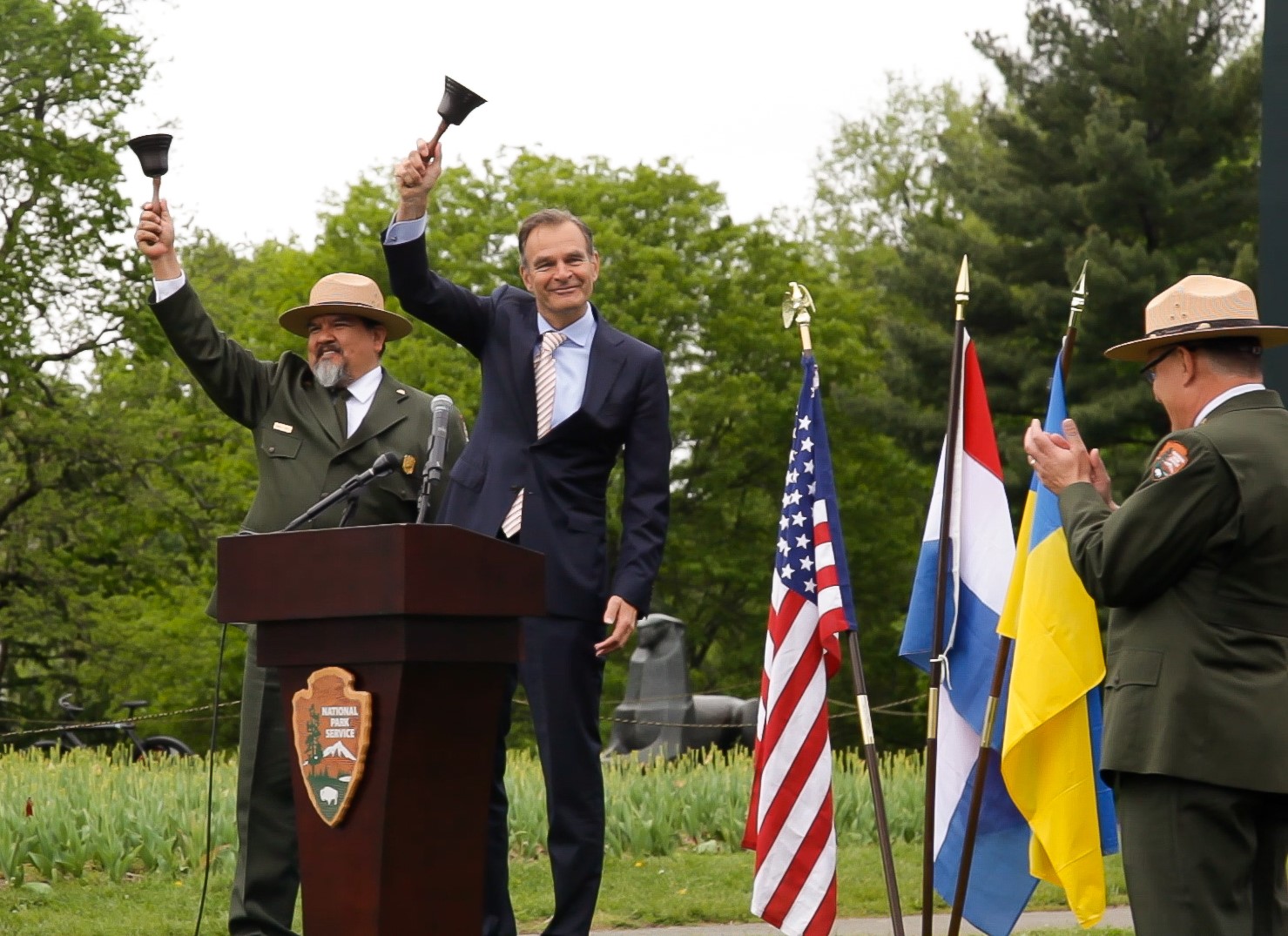 Director Chuck Sams and Ambassador Haspels ring bells celebrating the rehabilitation of the Netherlands Carillon.