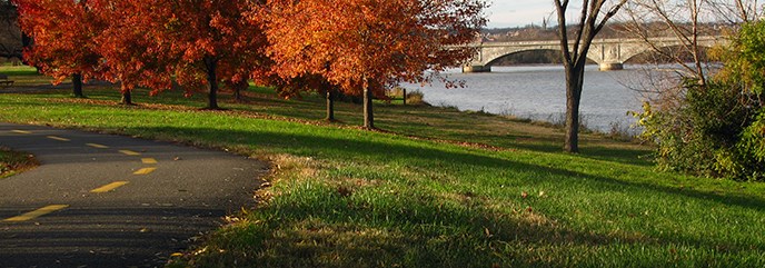 Mount Vernon Trail with fall foliage and Memorial Bridge in the background