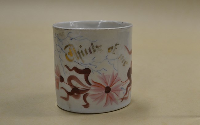 china remembrance cup with the "think of me" painted upon it