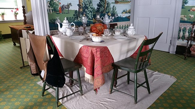 table set for two within a park period exhibit