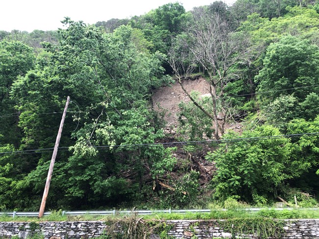 CookA_MarylandHeights_Landslide_052218 showing bare slope of 100ft by 100ft landslide