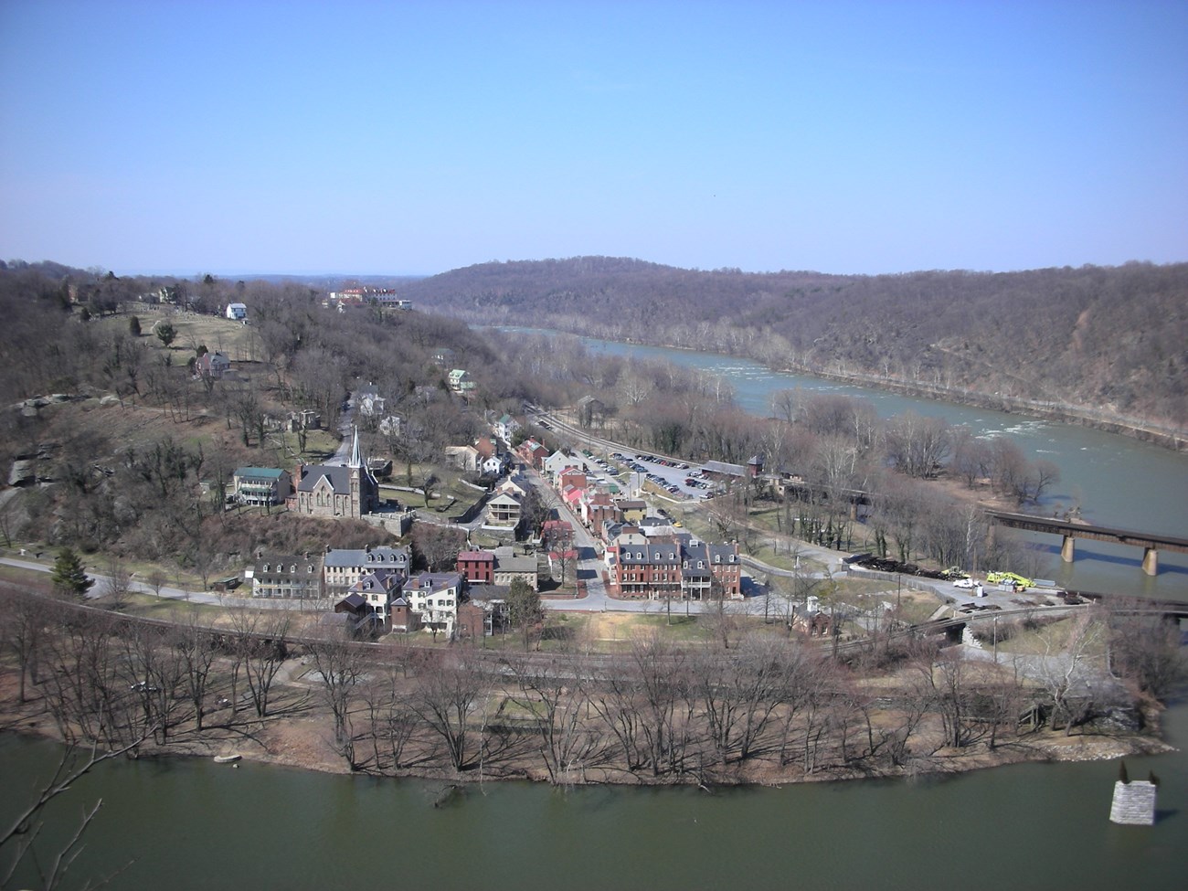 Comparative photo of the town of Harpers Ferry in 2008 taken from Loudoun Heights. Town from St. Peter's Roman Catholic Church to the Point is shown. The town is absent of an Armory.