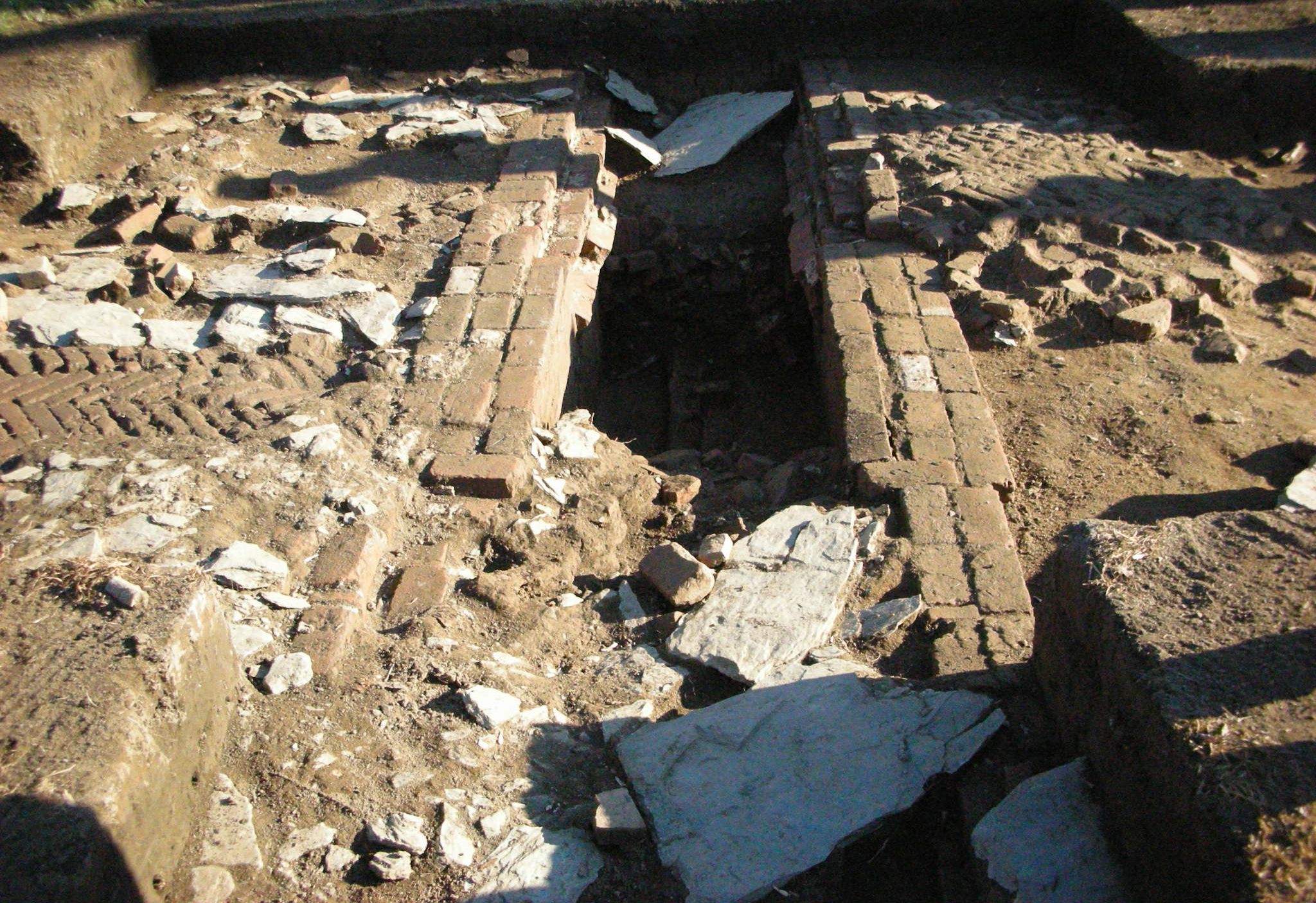 bricks and stones unearthed by an archeology excavation