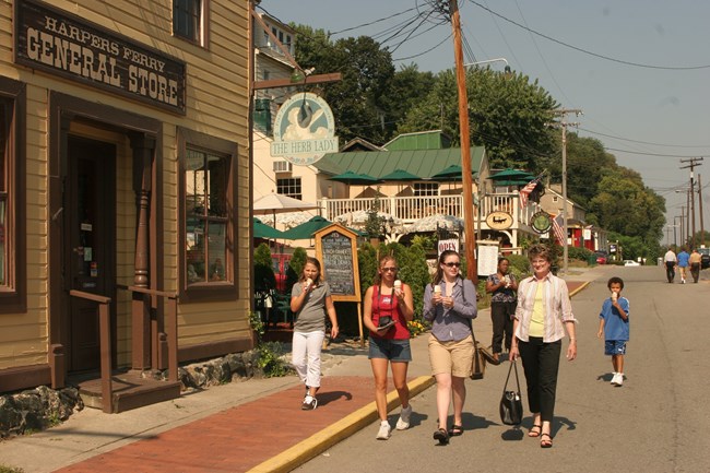 Visitors walking in the merchant district of Lower Town