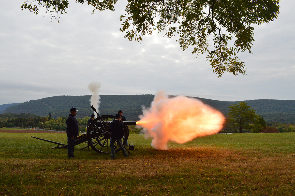 Artillery crew firing a cannon at Bolivar Heights Battlefield