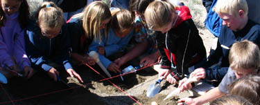 Students enjoy an educational program at the Fossil Beds. Students enjoy an educational program at the Fossil Beds.