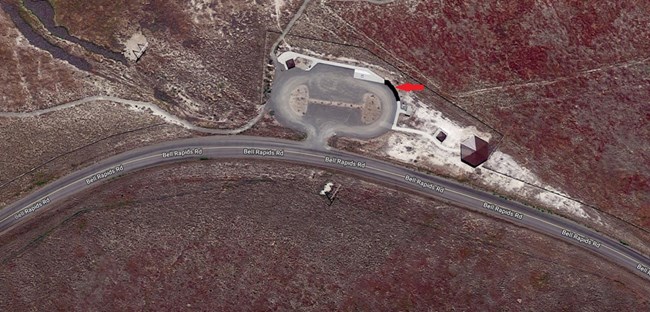 Ariel photo of the Oregon Trail Overlook with a red arrow pointing to demonstration area.