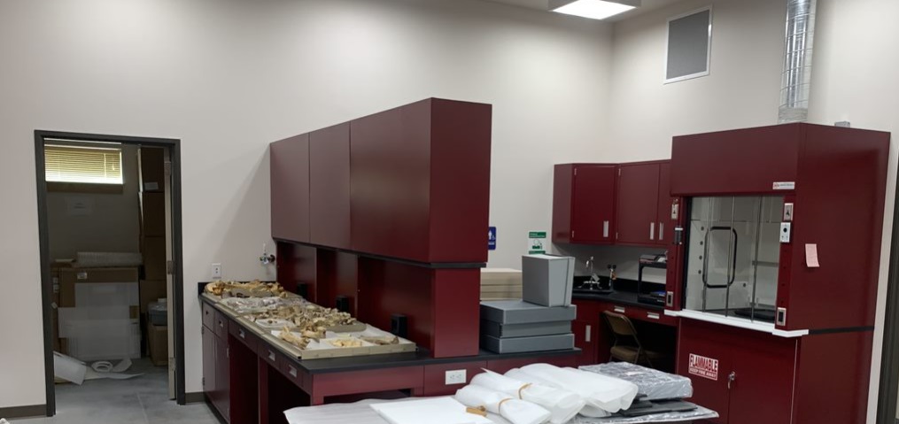interior of paleo lab with red counters and microscopes