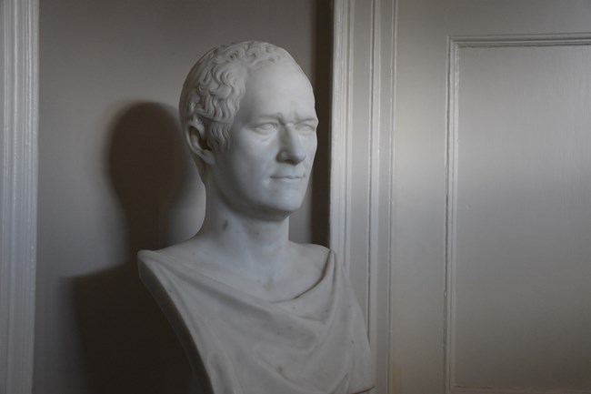 A white statue bust.