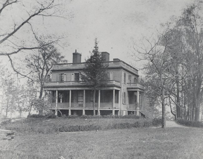 Black and white photograph of a home.