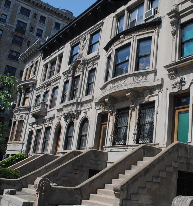 Harlem today A row of brownstone apartments facing the street.