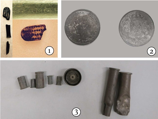 archeological artifacts from Haleakala. A wooden toothbrush, bullets, and a 5 french Franc.