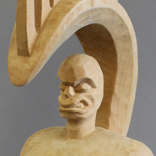 wooden statue of Lono