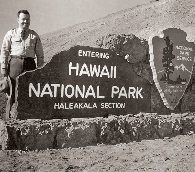 Ranger at Park Sign