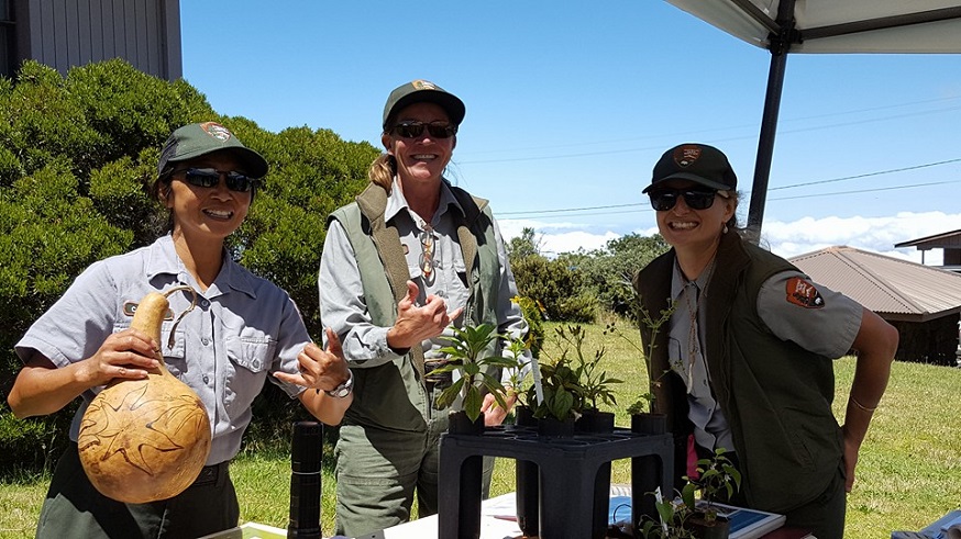 Biologist Cathleen Bailey, Botanist Patty Welton, and Archaeologist Rachel Hodara share some greenhouse and museum treasures with visitors.